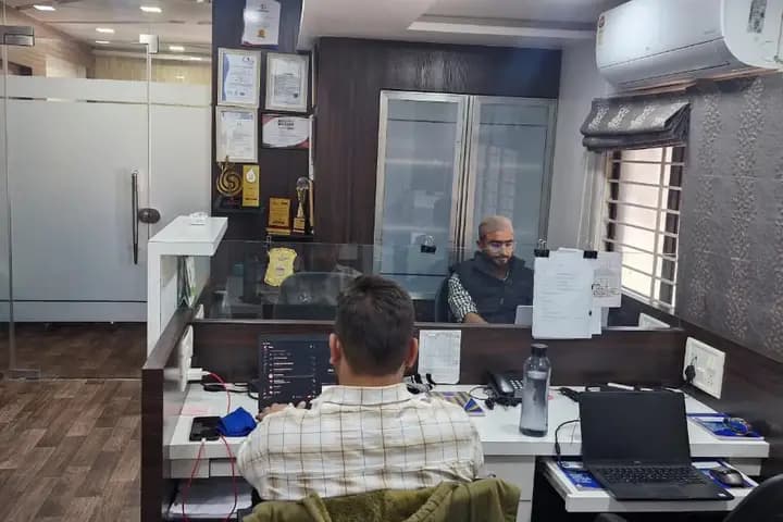 NNT Software engineers at their desks